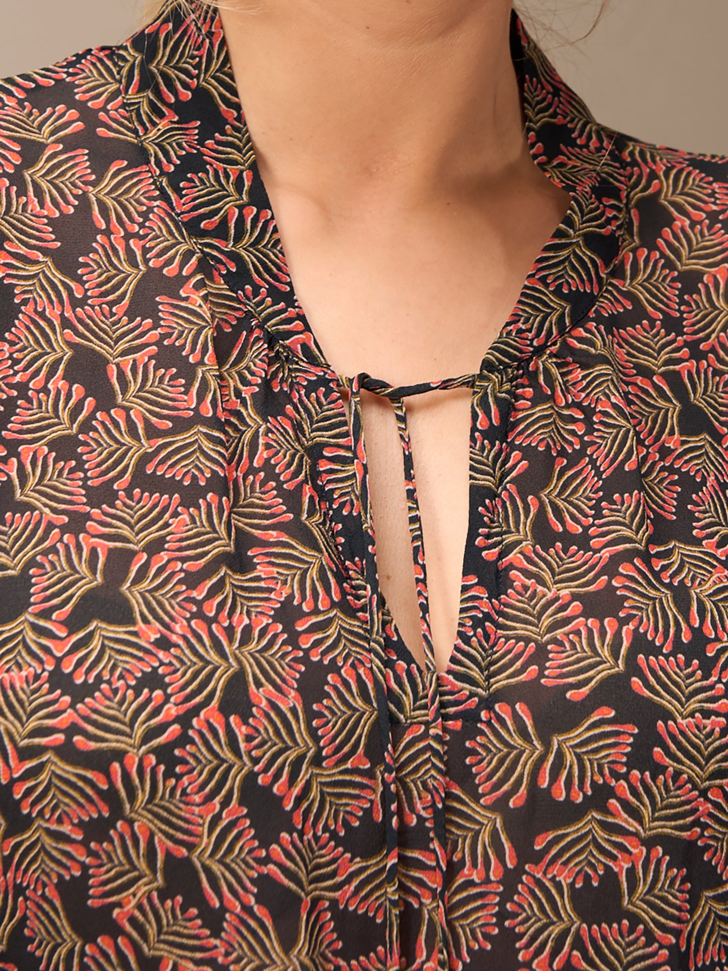 Blouse with stand-up collar
