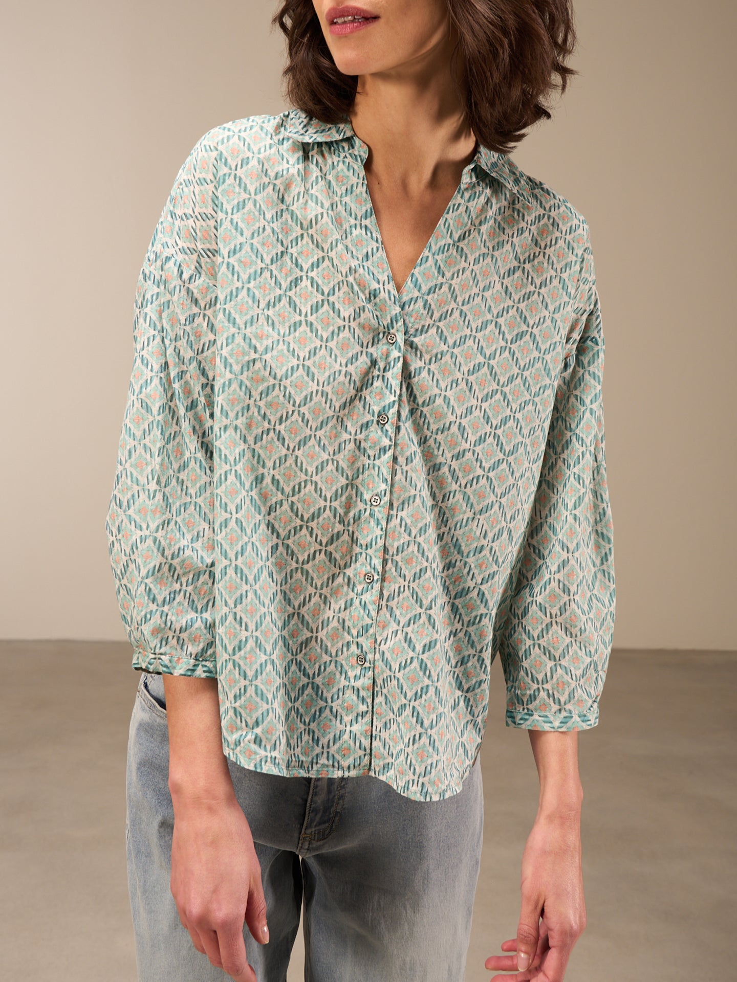 Blouse with button placket