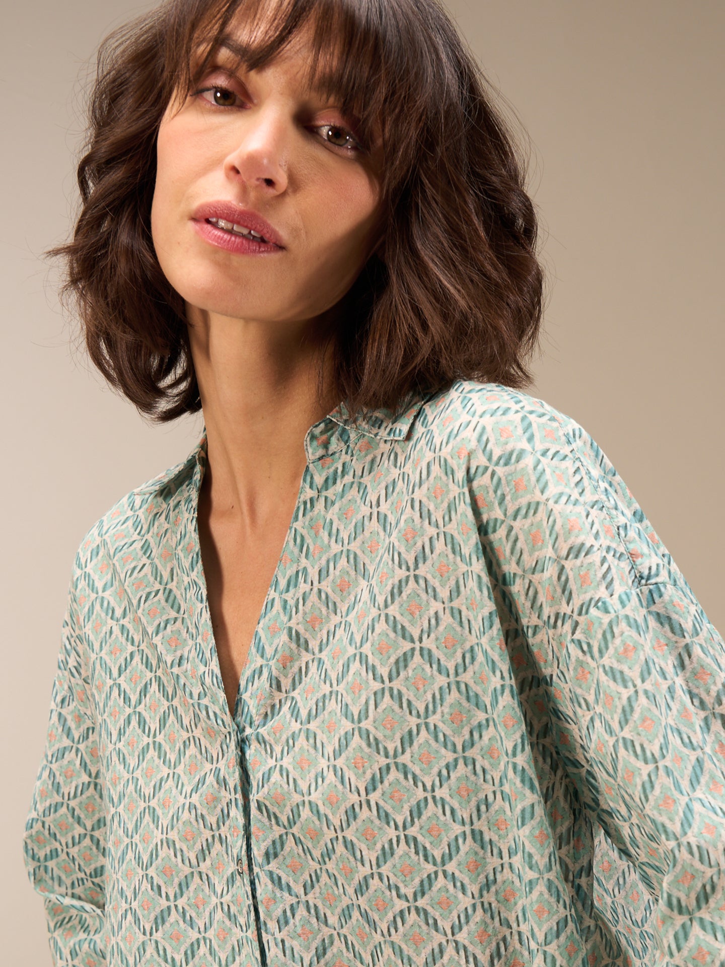 Blouse with button placket