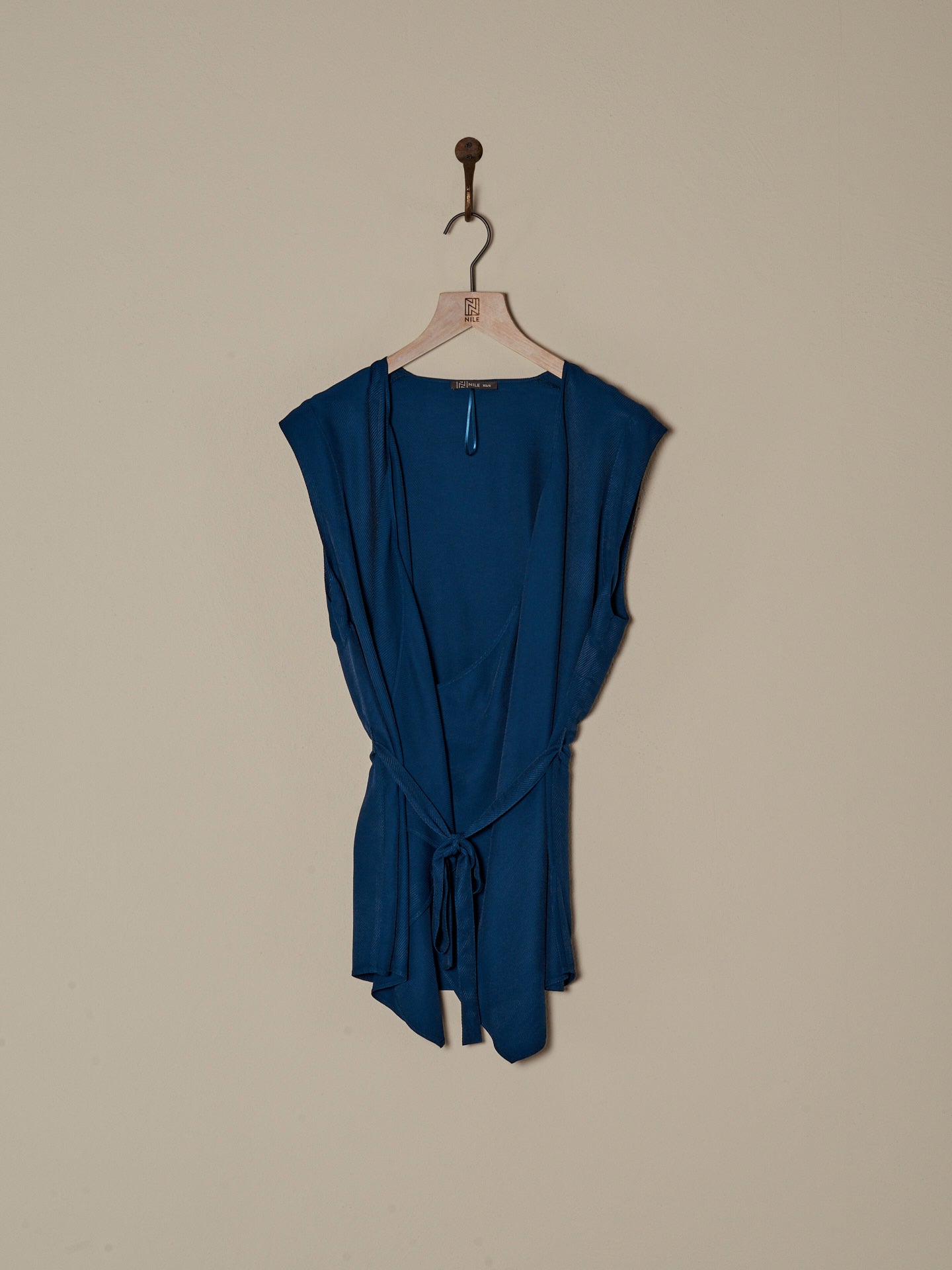 Vest with belt