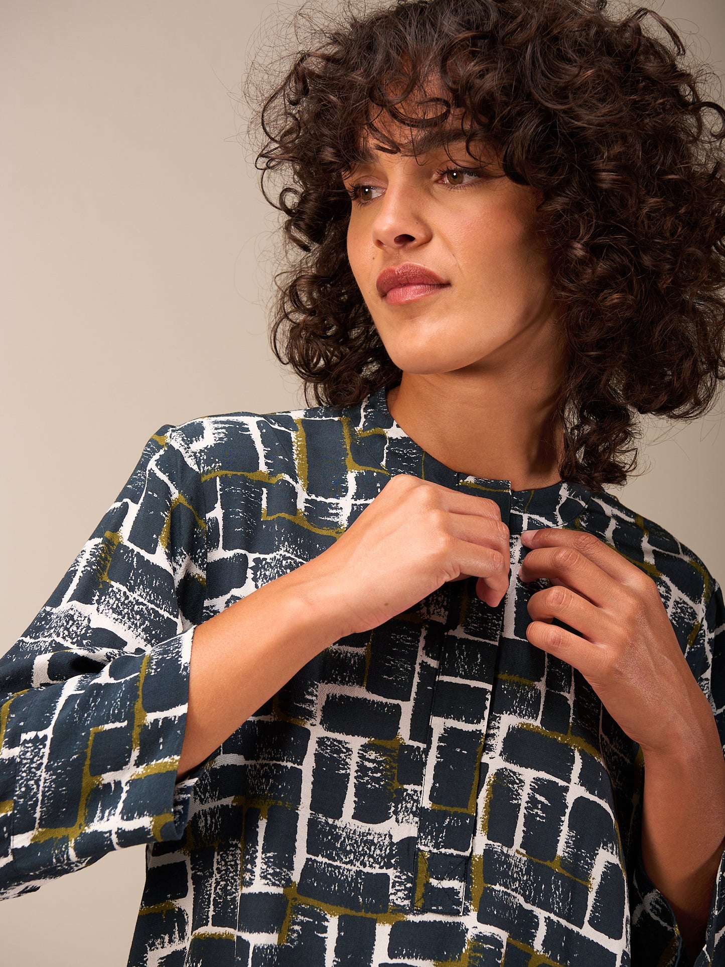 Blusa con maniche a 3/4