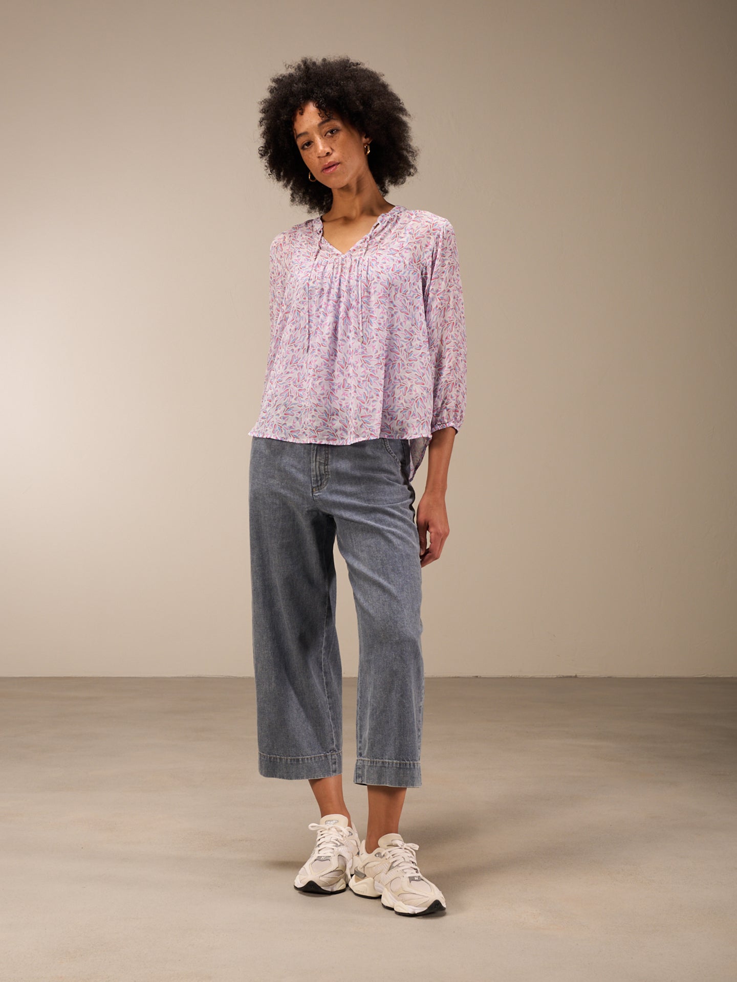 Blouse with flounce