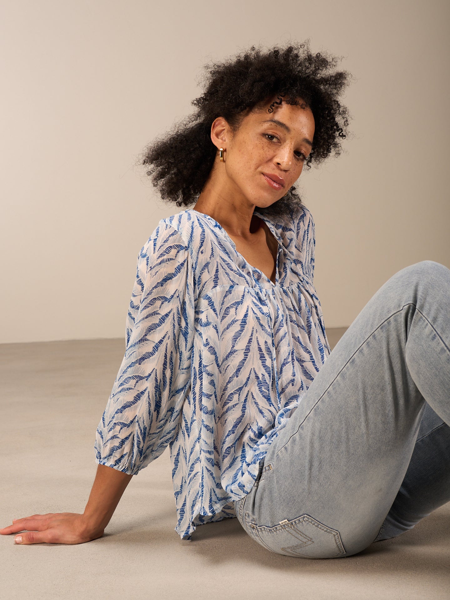 Blouse with flounce