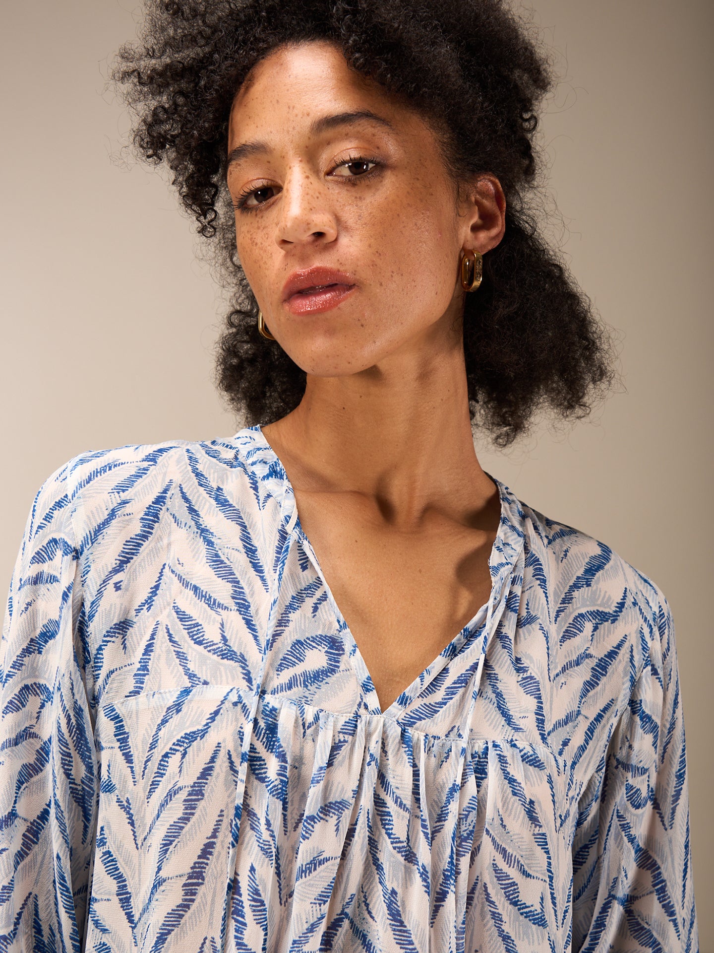 Blouse with flounce