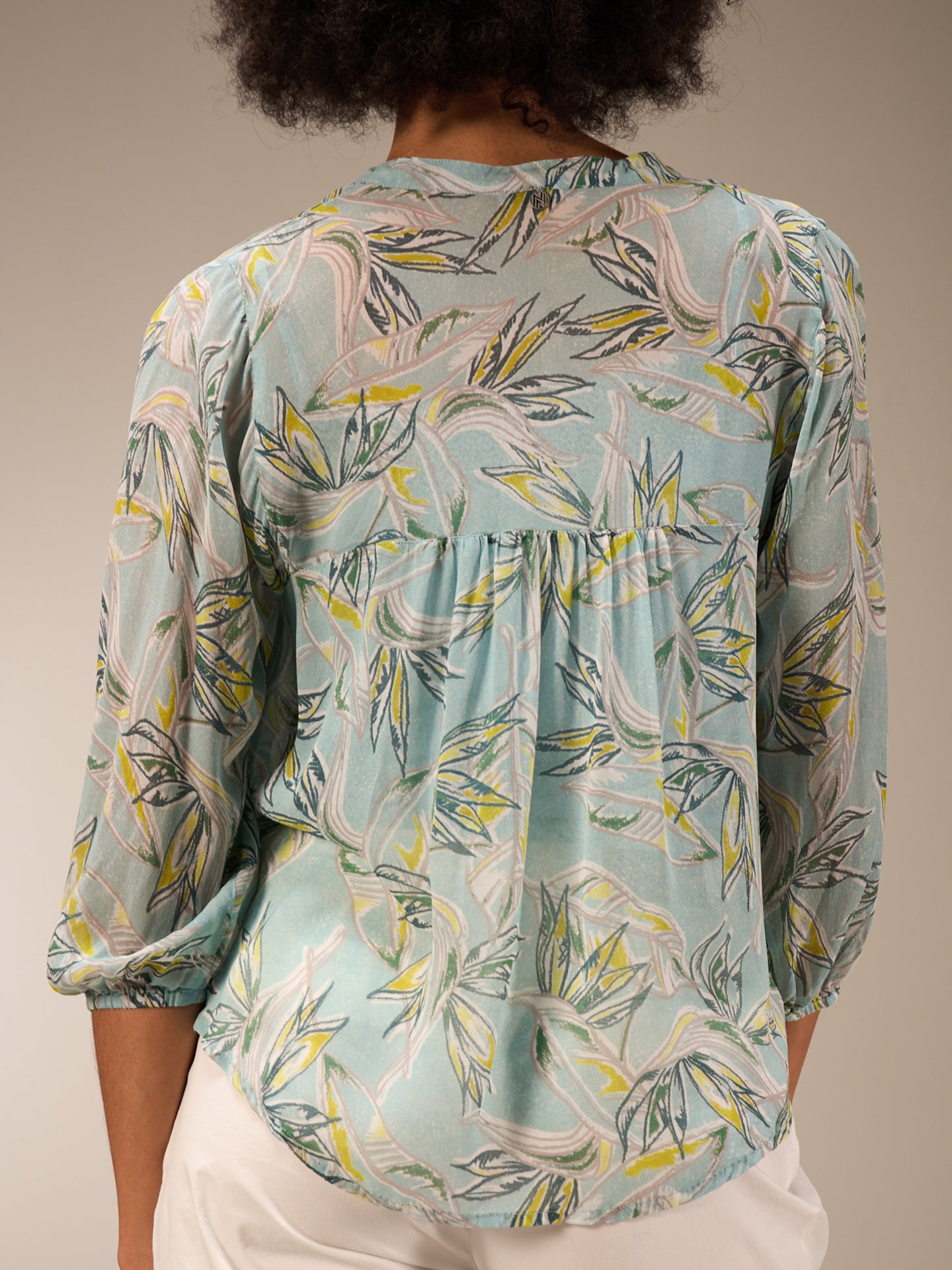 Blouse with flounce