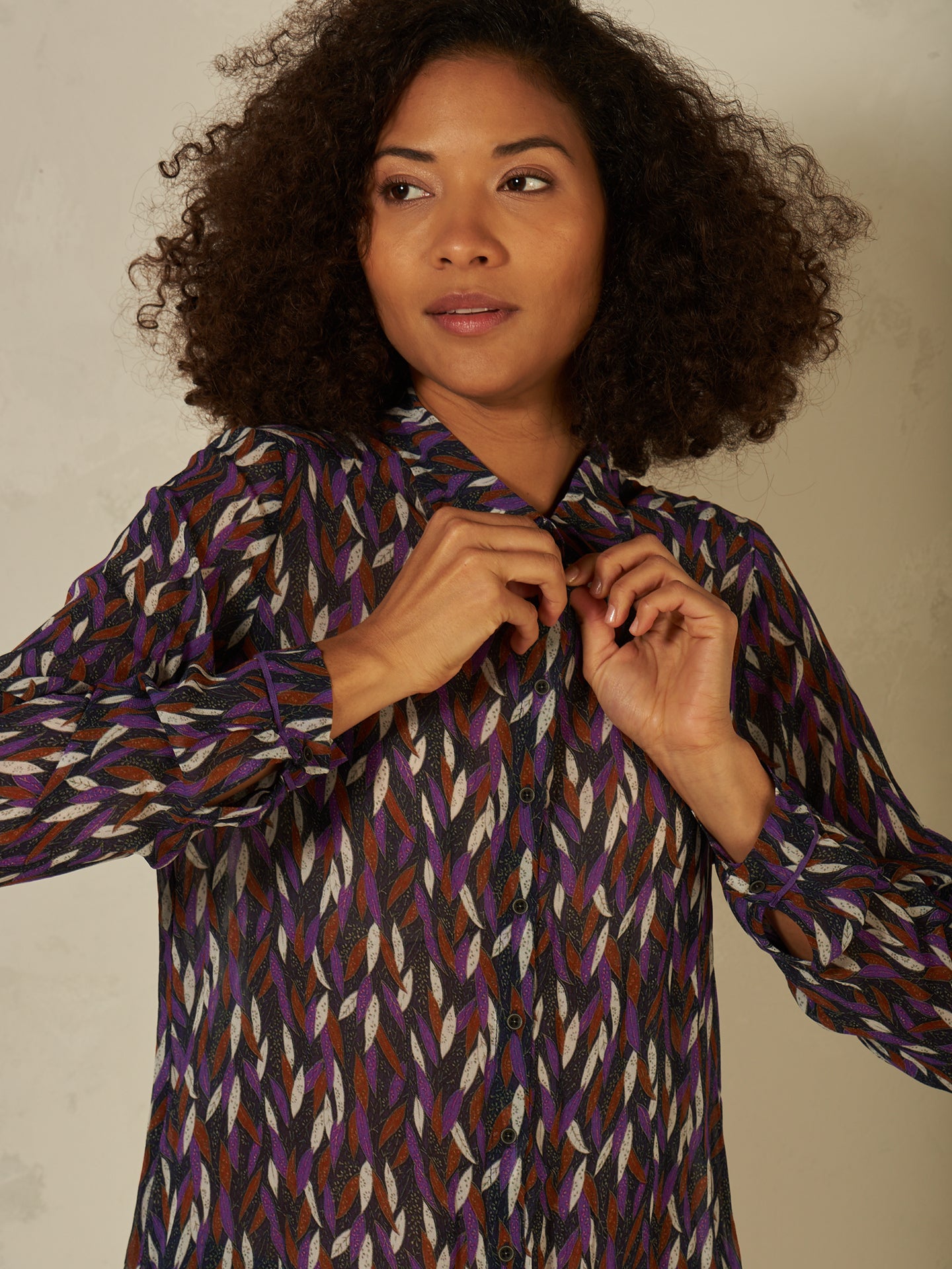 Blusa con abbottonatura
