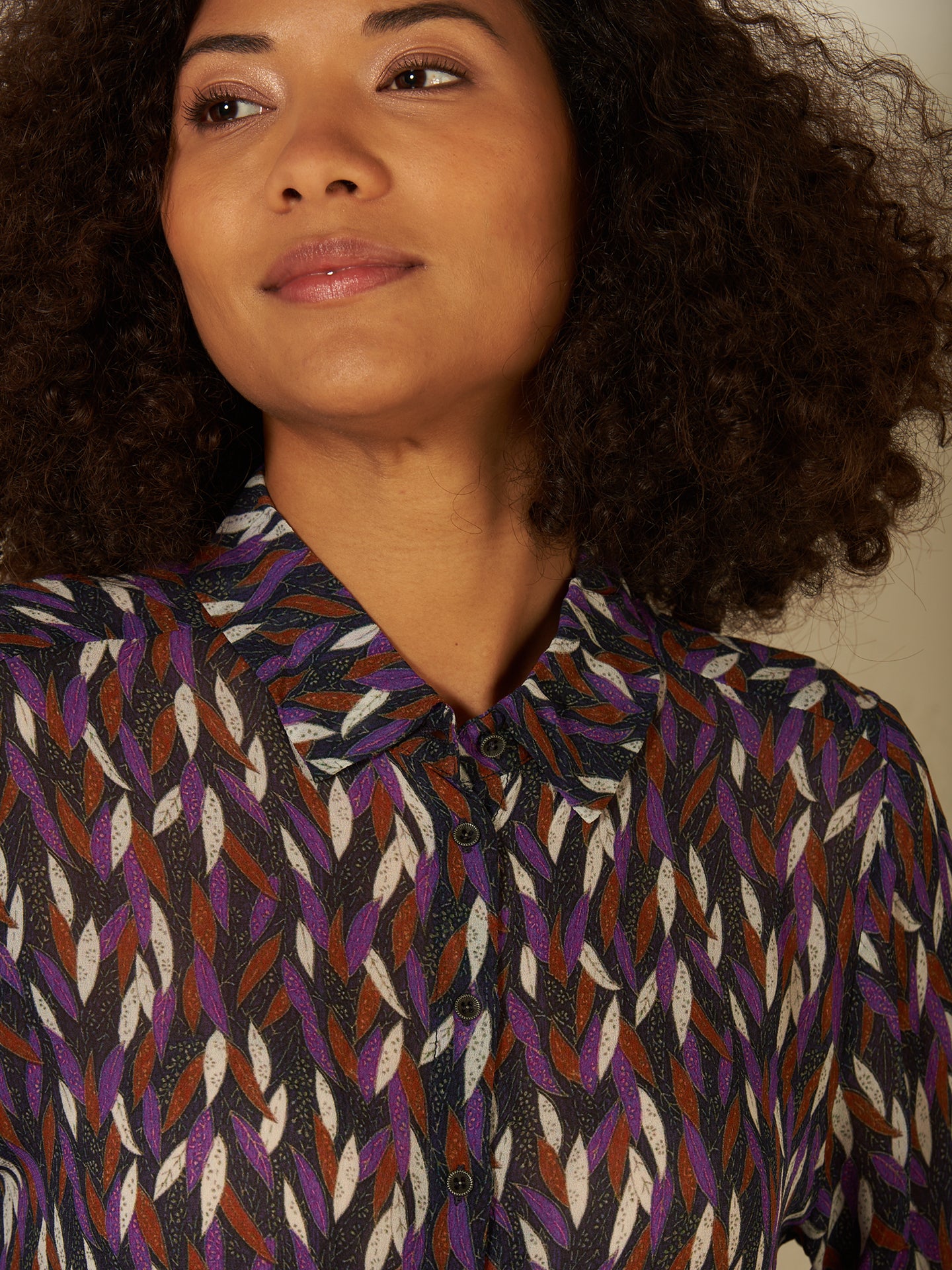 Blusa con abbottonatura