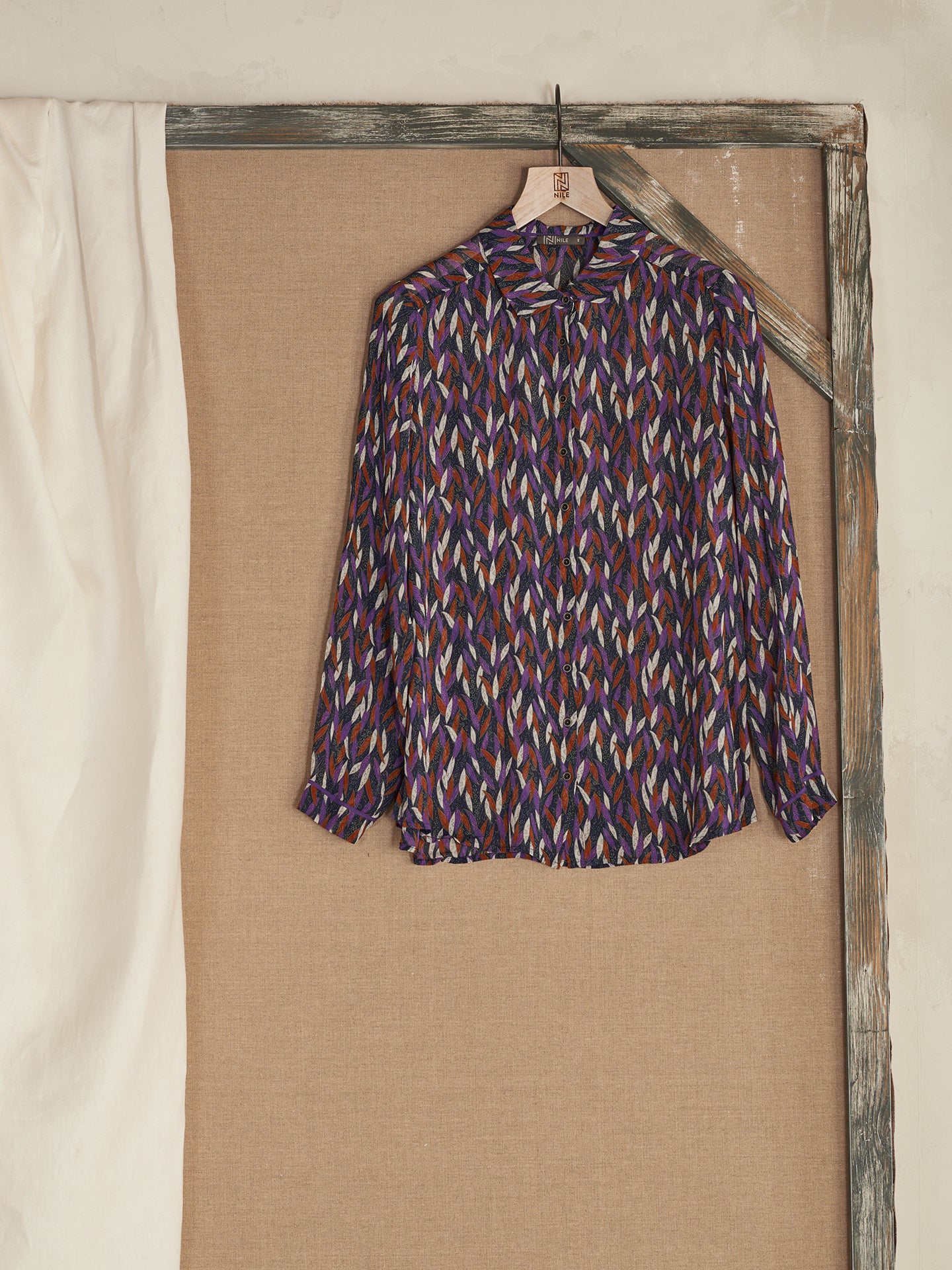 Blusa con abbottonatura