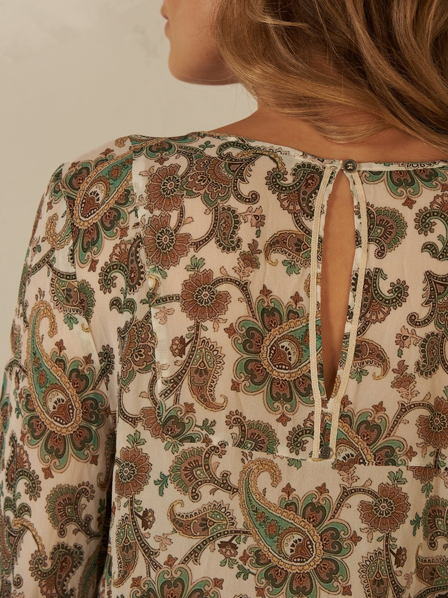 Blusa con scollo a V