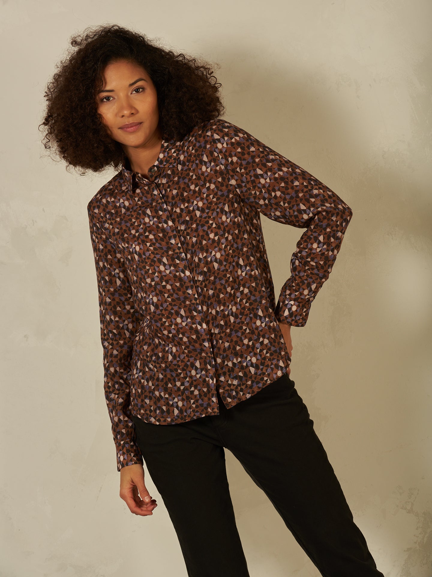 Blusa con abbottonatura
