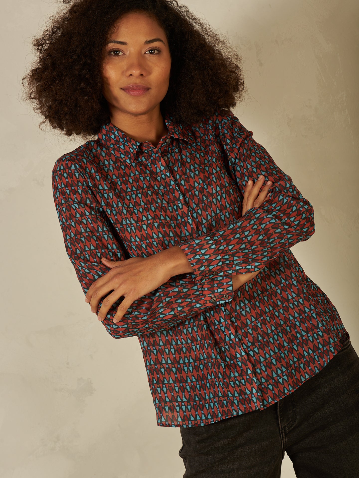 Blusa con abbottonatura