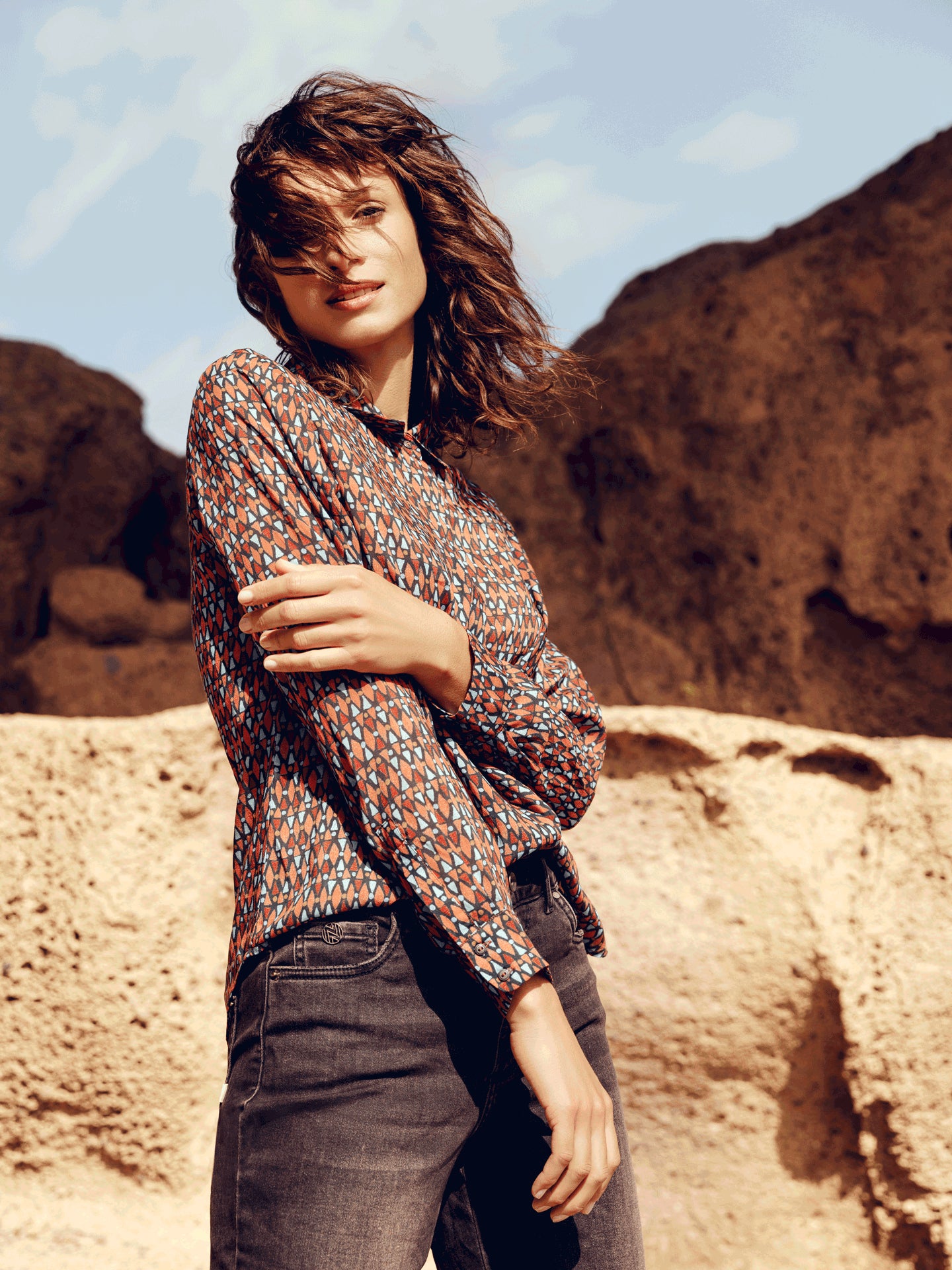 Blusa con abbottonatura