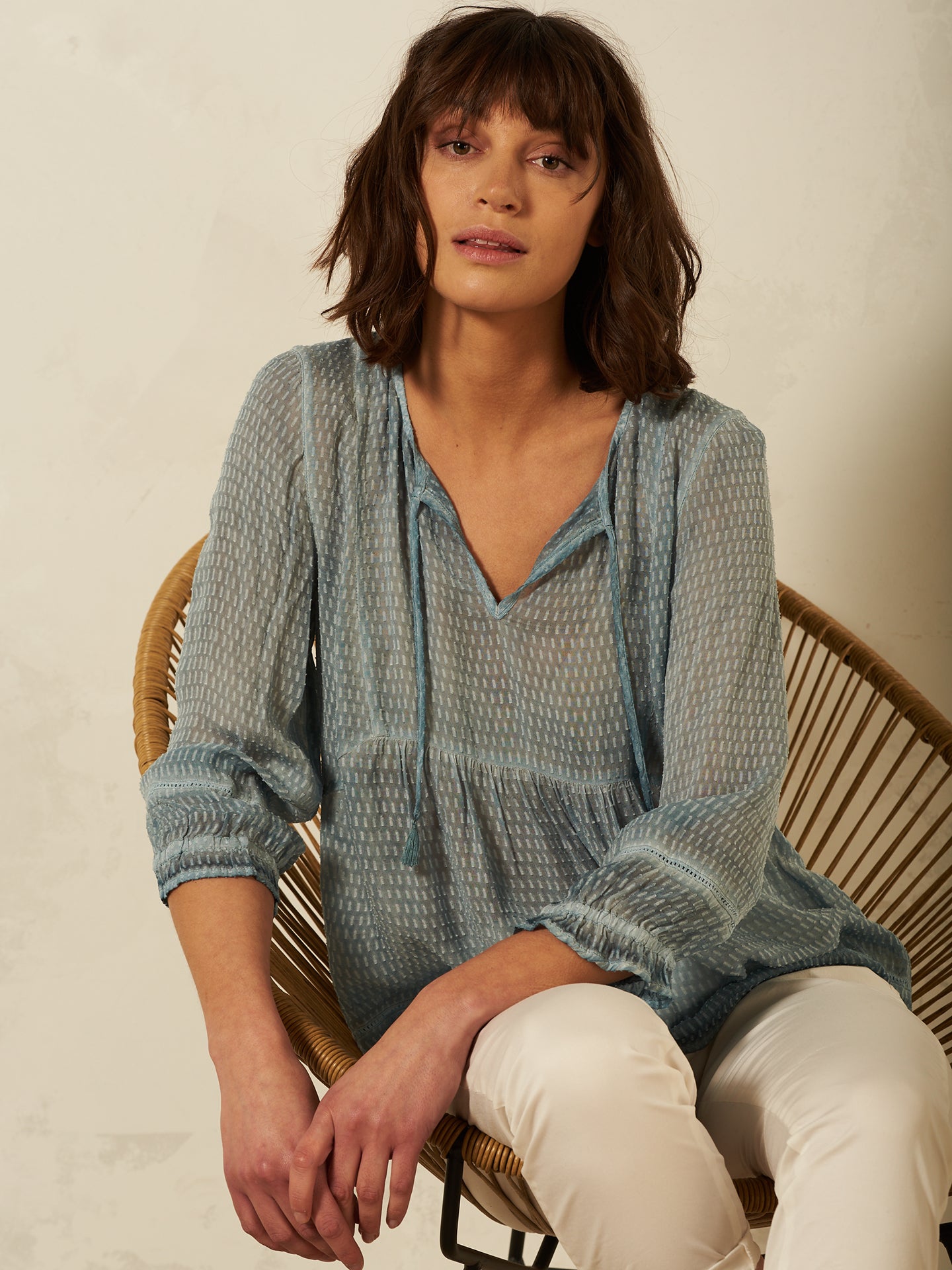 Blusa con dettaglio all’uncinetto
