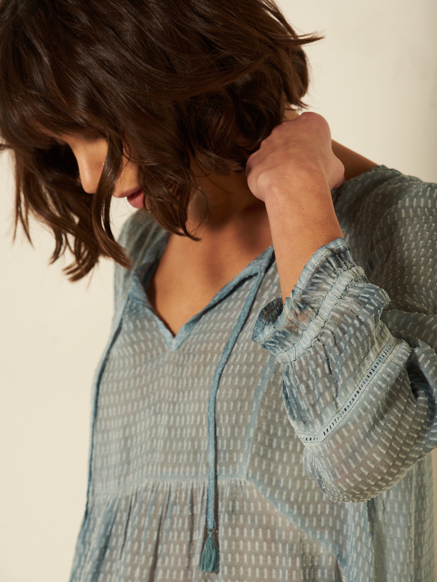 Blusa con dettaglio all’uncinetto