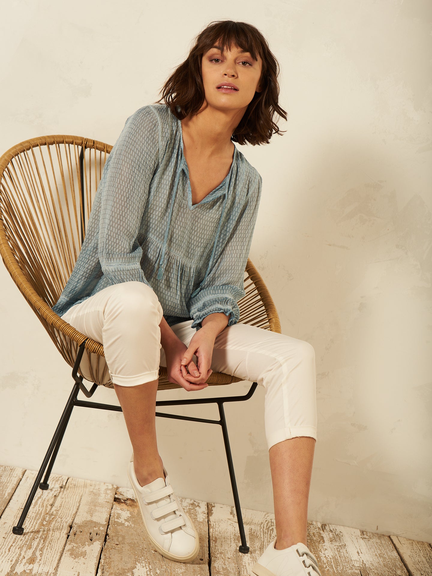 Blusa con dettaglio all’uncinetto