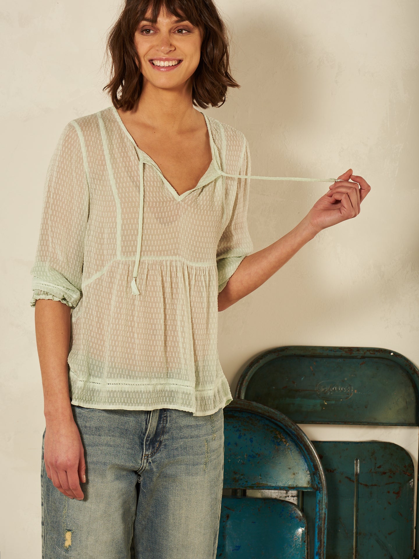Blusa con dettaglio all’uncinetto