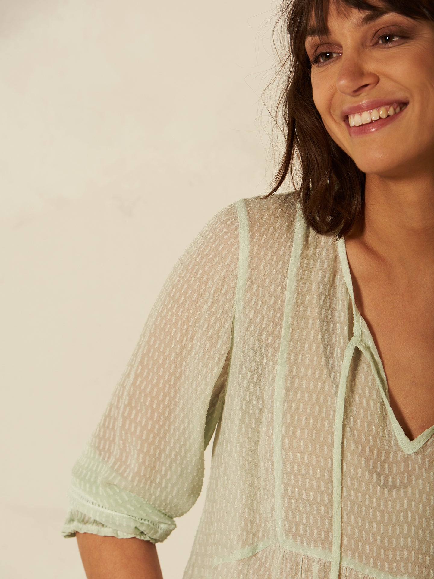 Blusa con dettaglio all’uncinetto