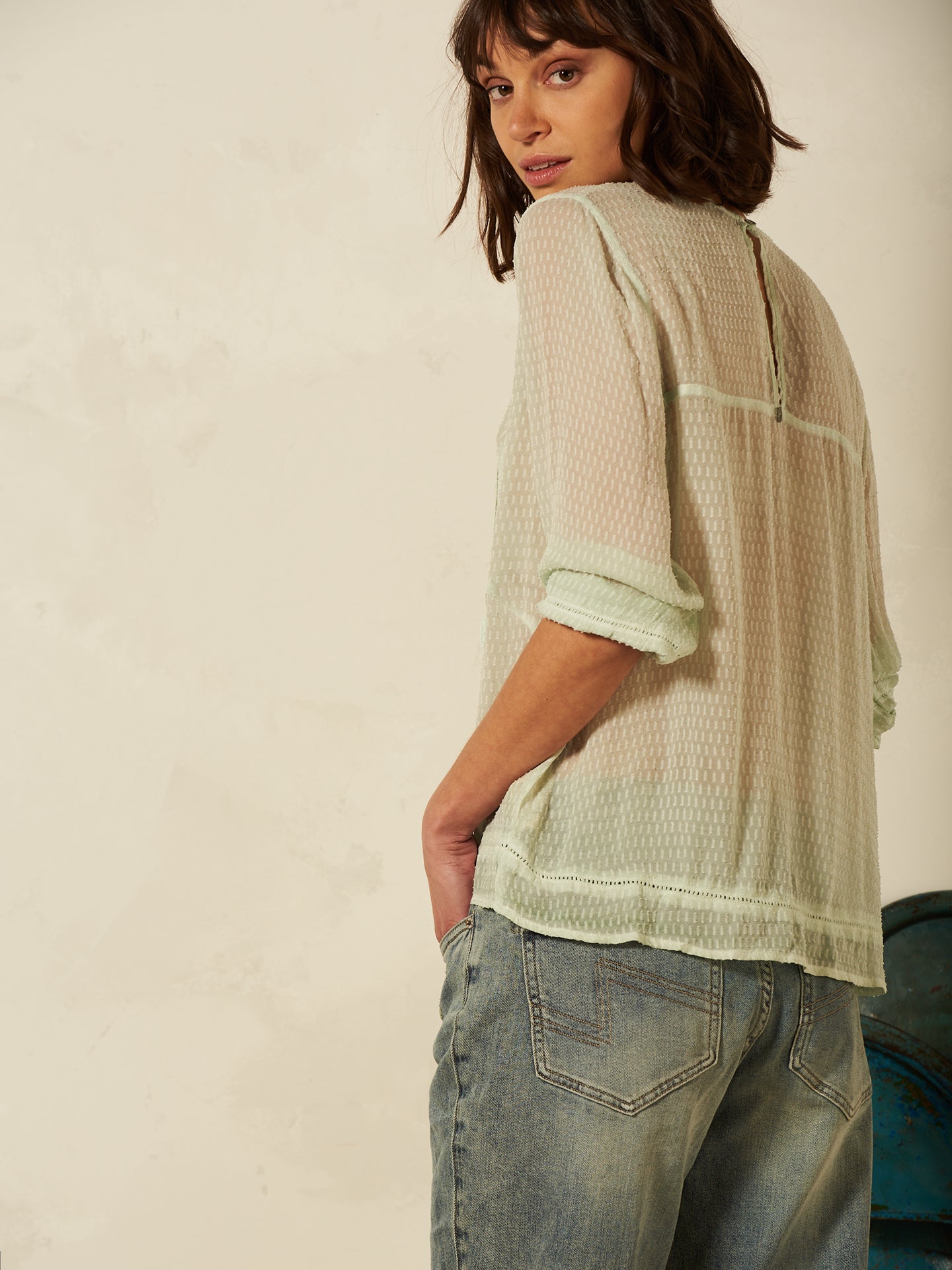 Blusa con dettaglio all’uncinetto