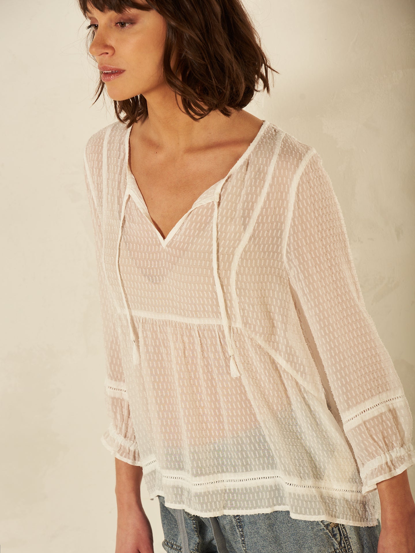 Blusa con dettaglio all’uncinetto