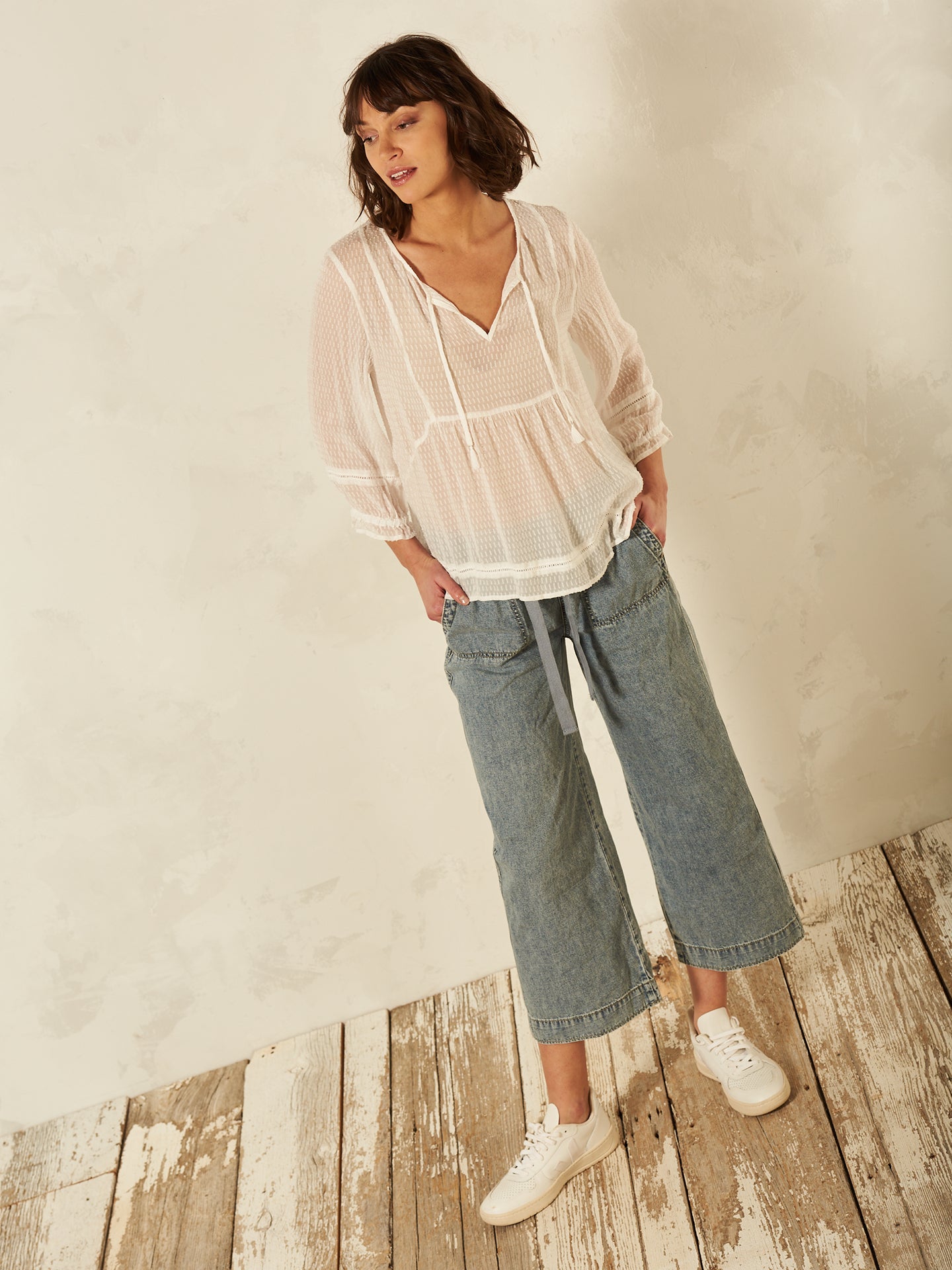 Blusa con dettaglio all’uncinetto