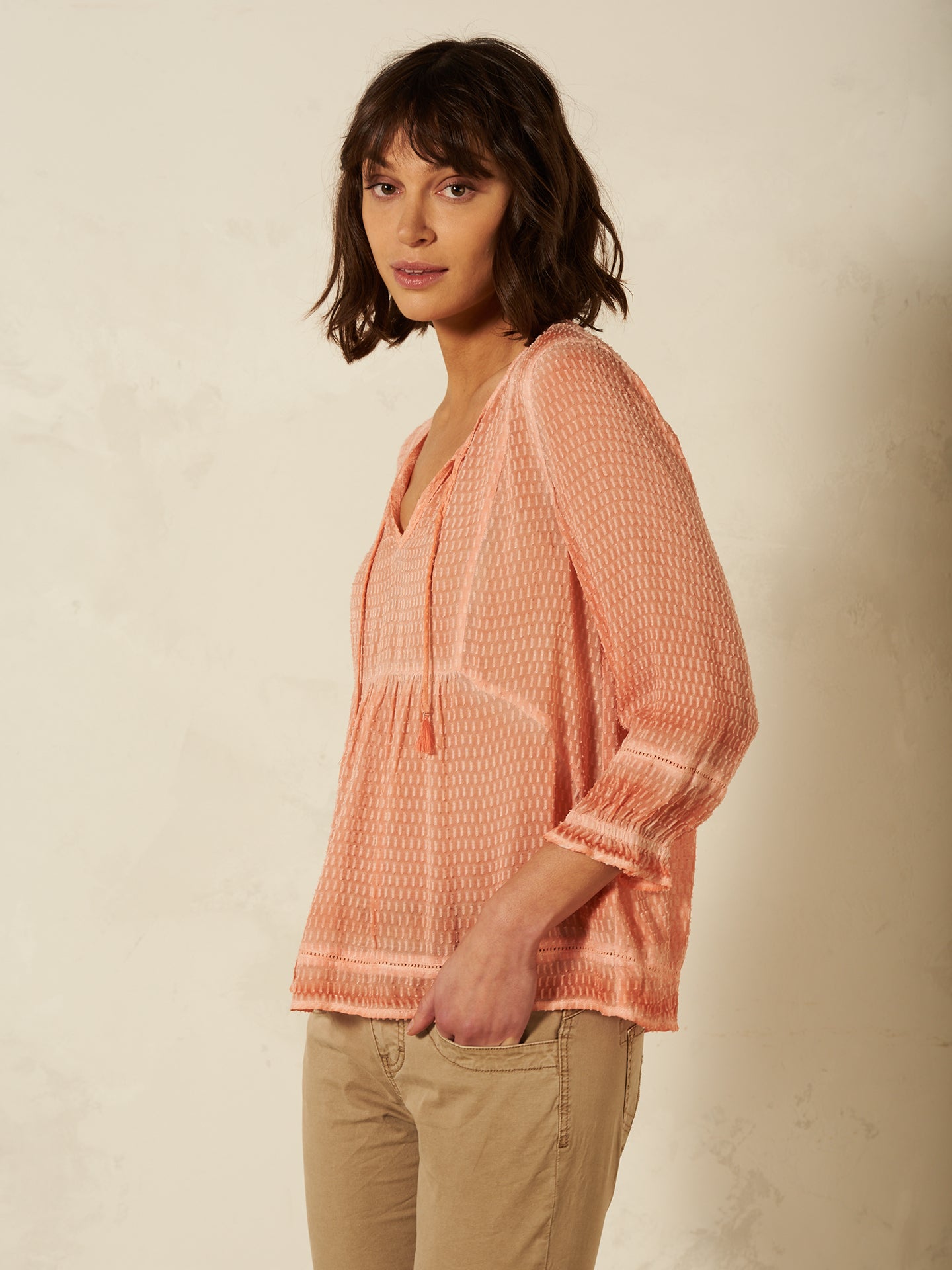 Blusa con dettaglio all’uncinetto