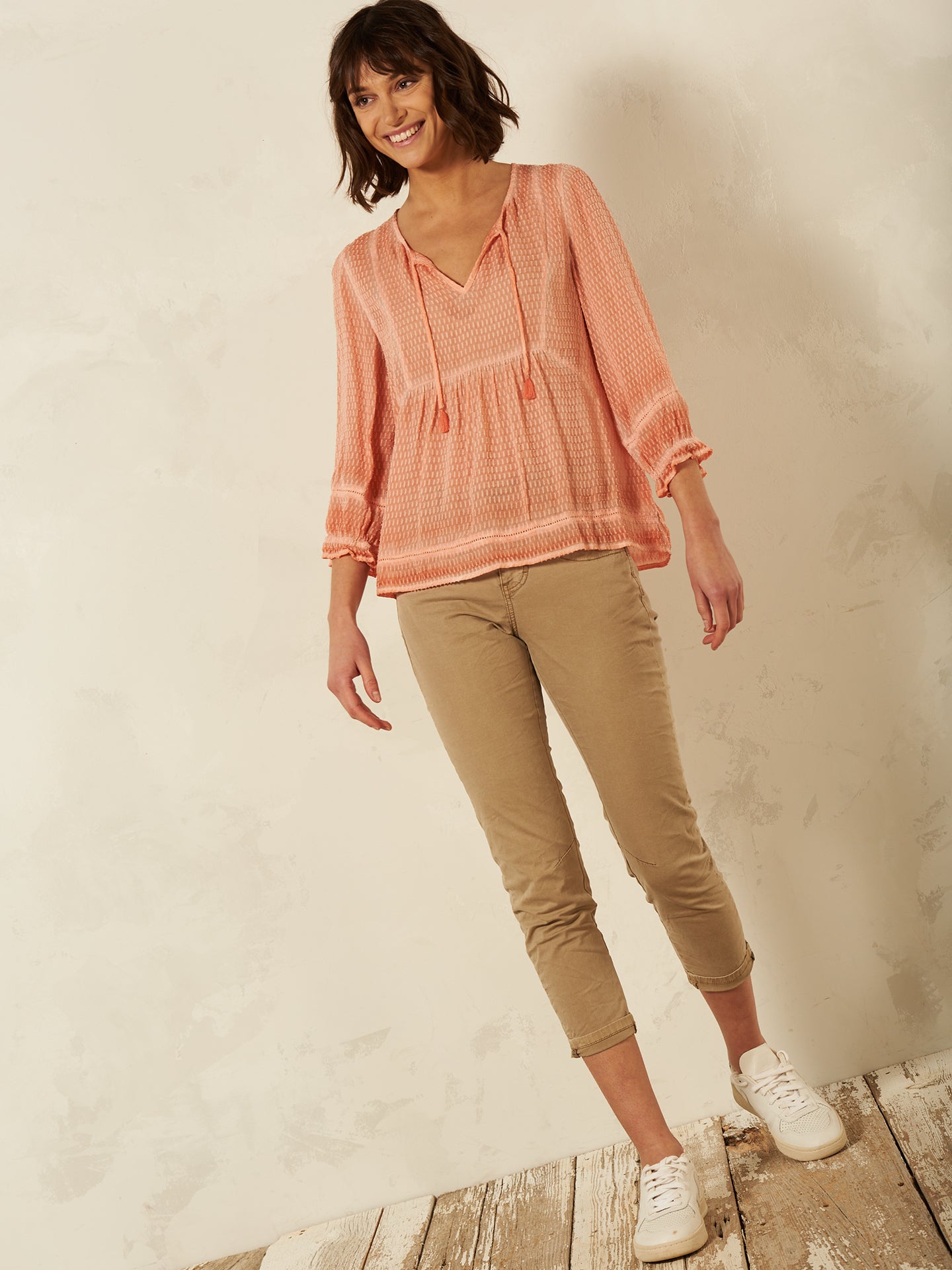 Blusa con dettaglio all’uncinetto