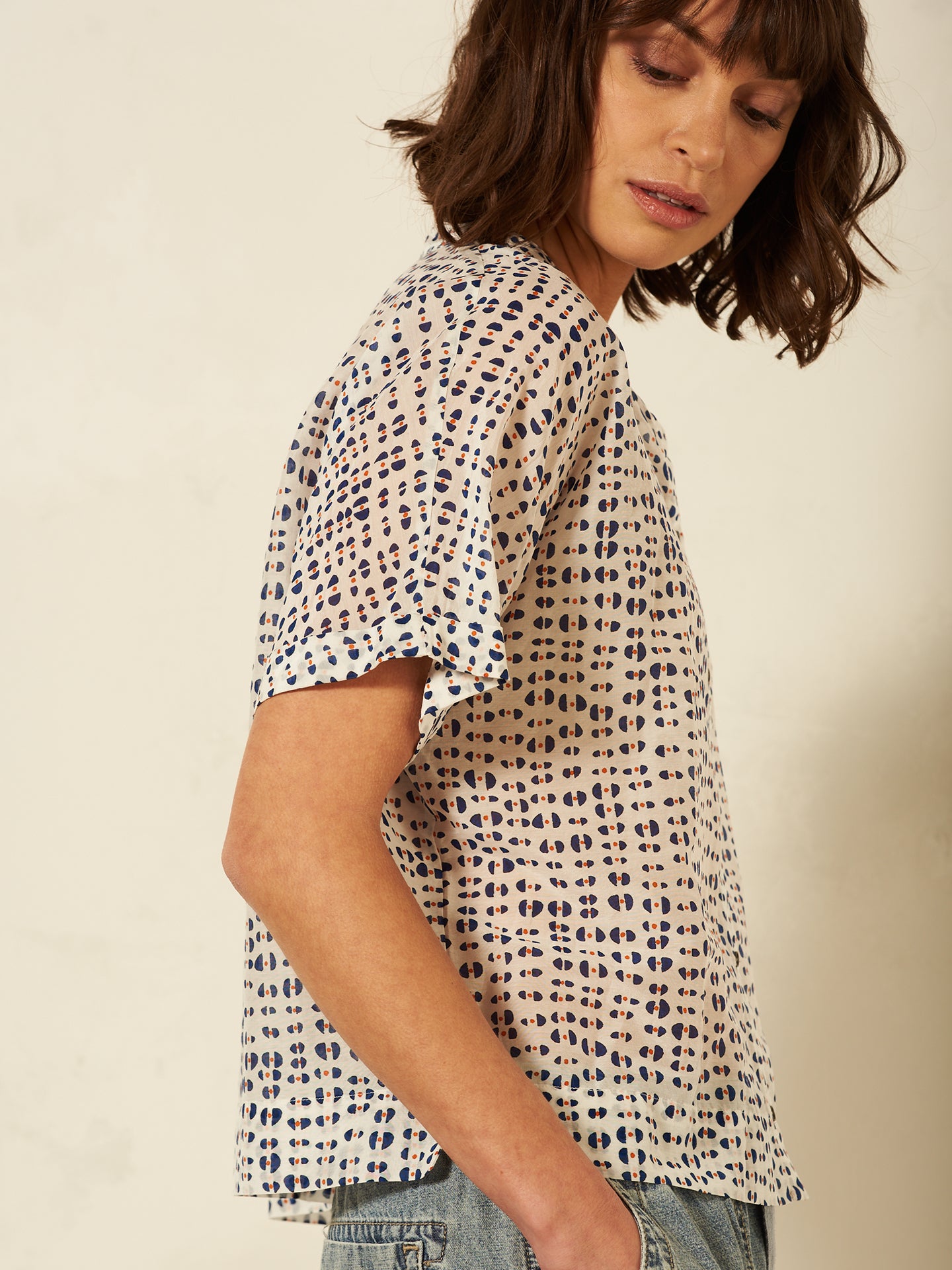 Blusa con abbottonatura