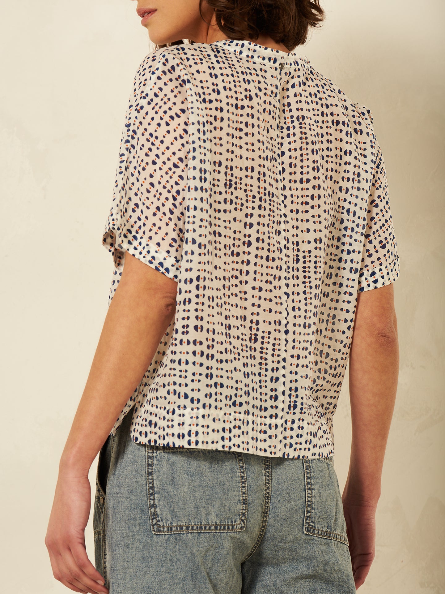 Blusa con abbottonatura