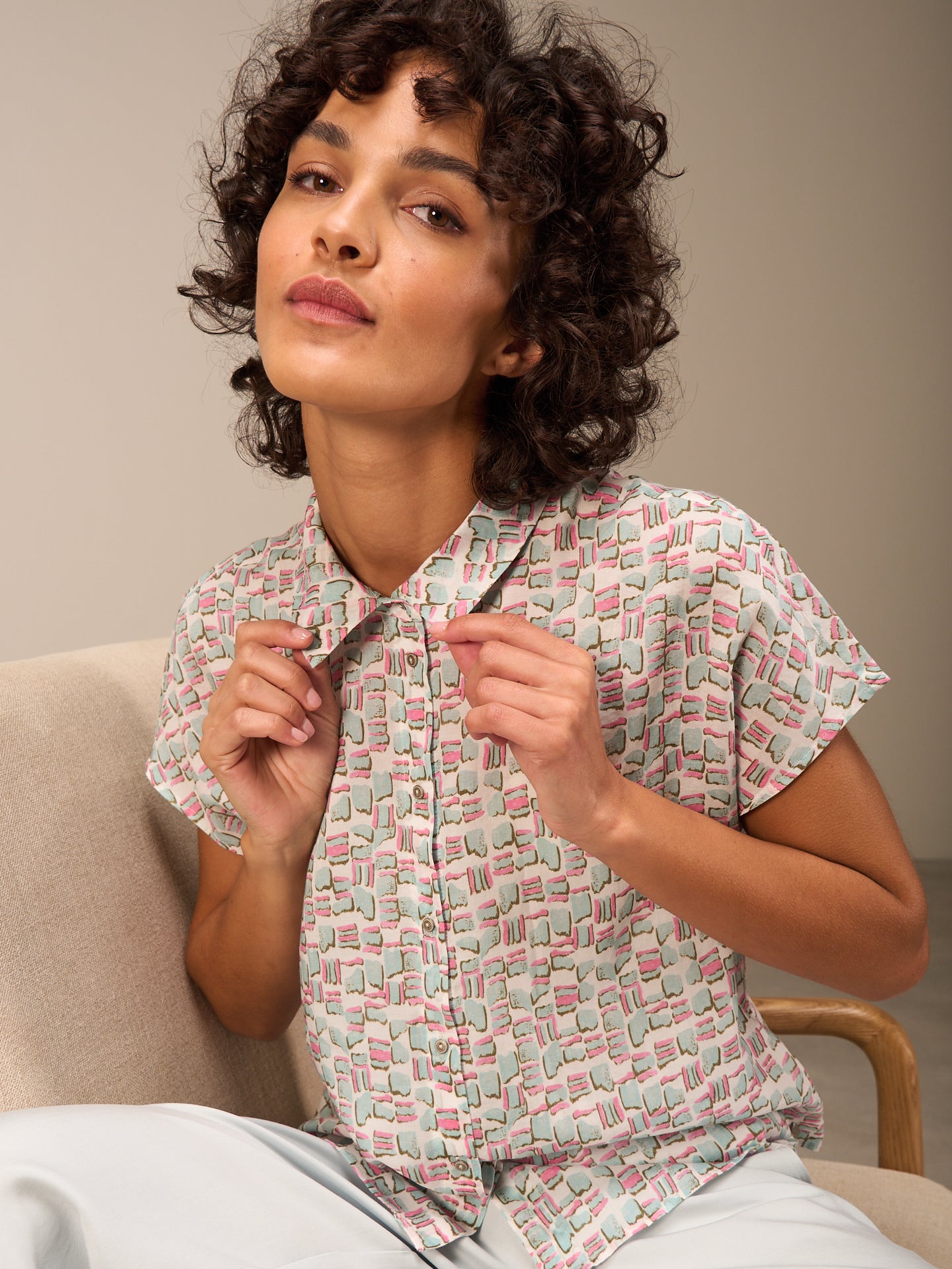 Blusa con abbottonatura