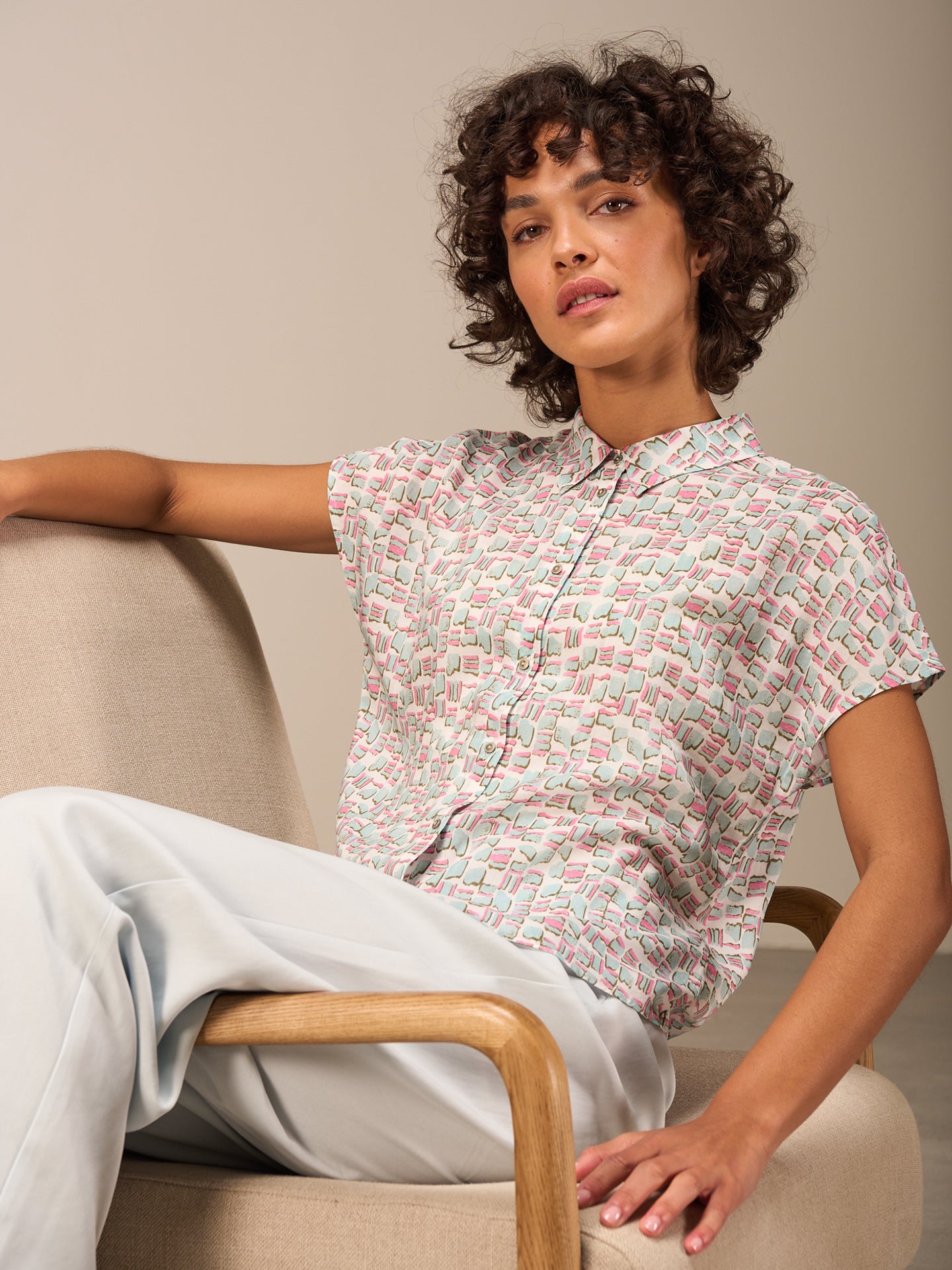 Blusa con abbottonatura