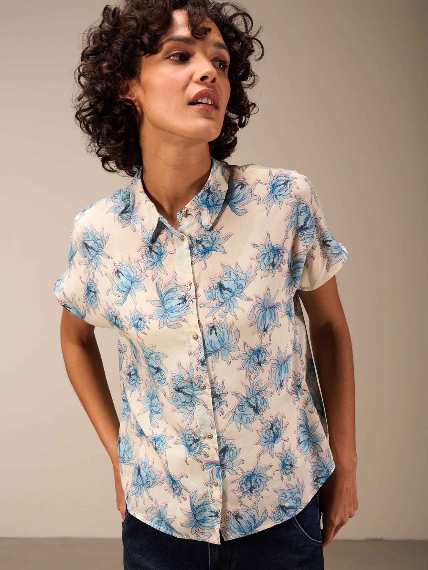 Blusa con abbottonatura