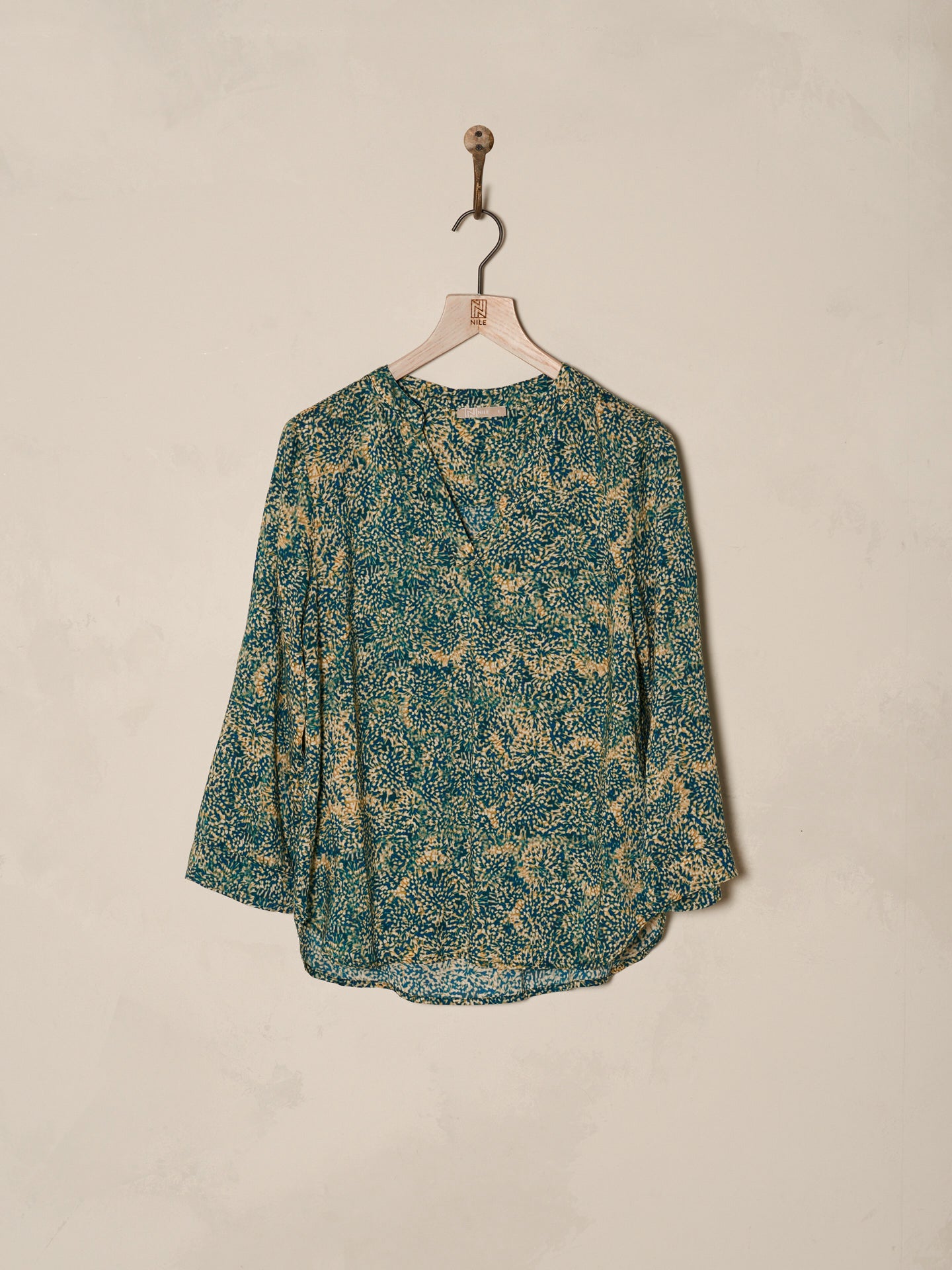 Blusa con scollo a V