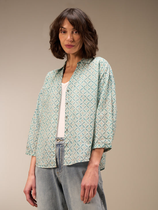 Blouse with button placket