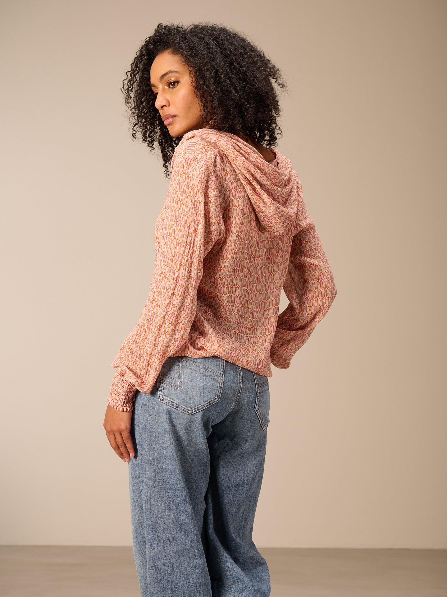 Blusa con cappuccio