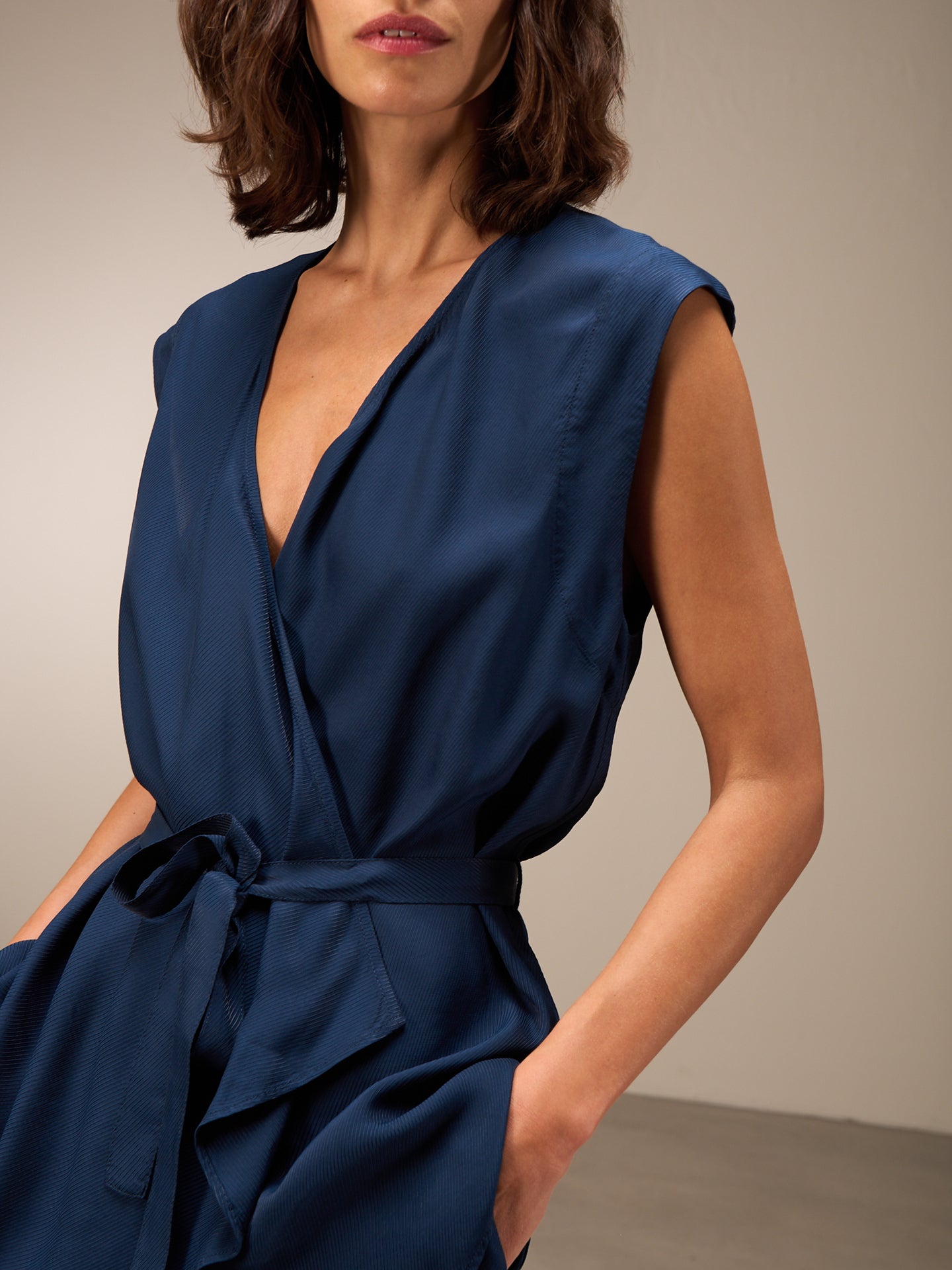 Vest with belt