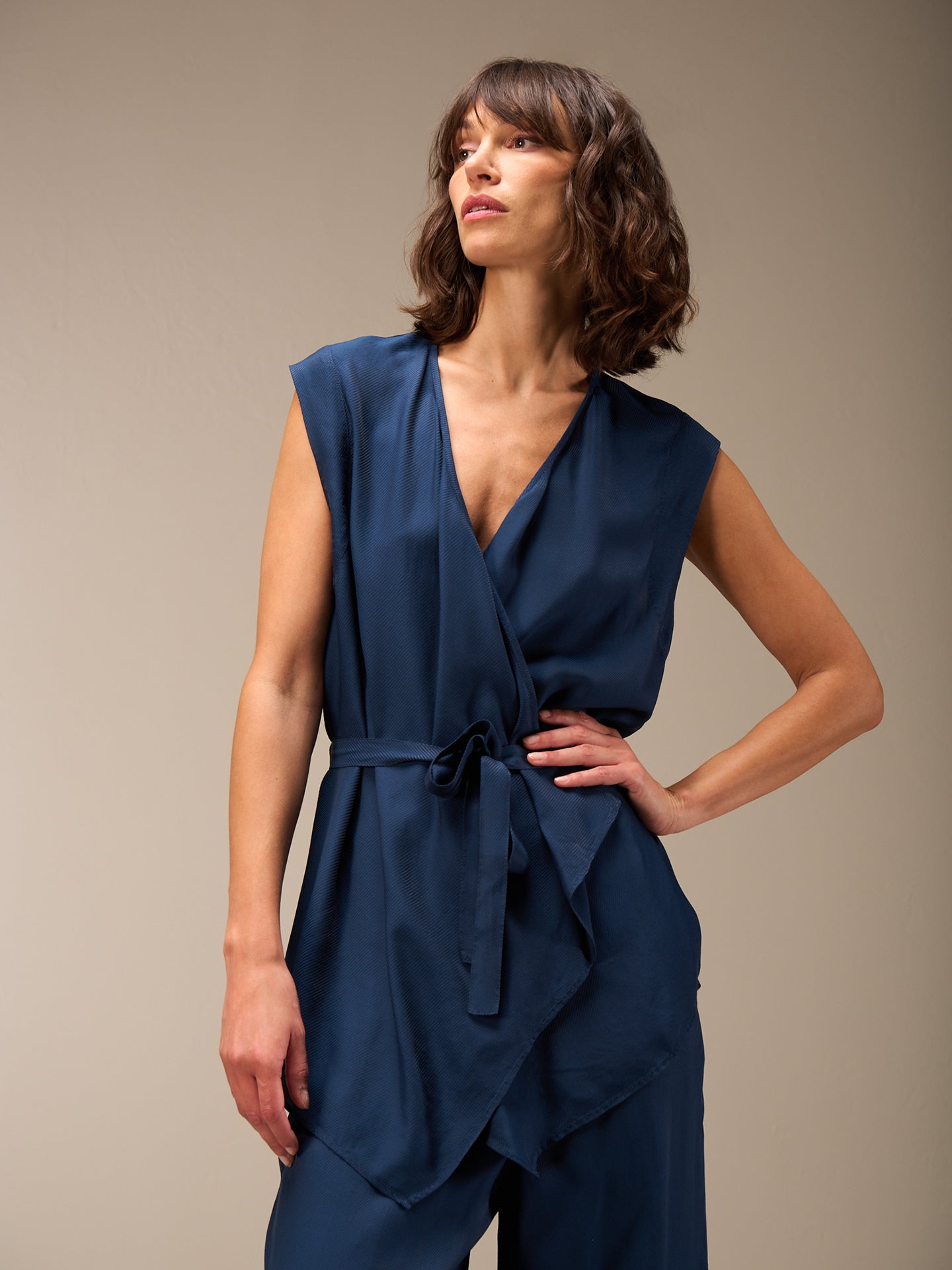 Vest with belt