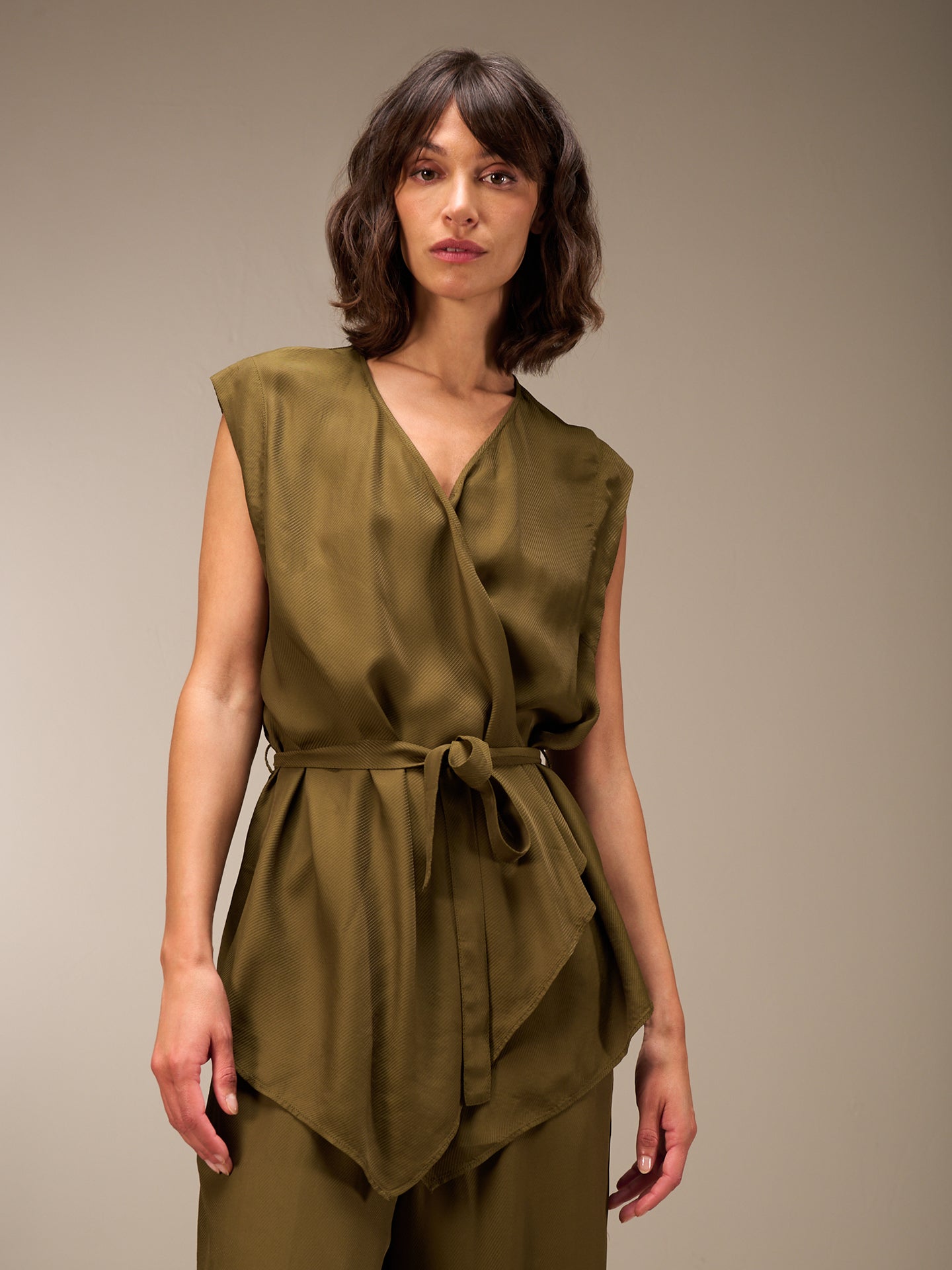 Vest with belt