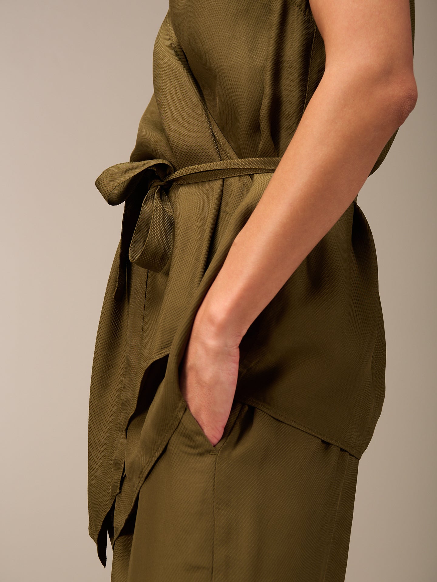 Vest with belt