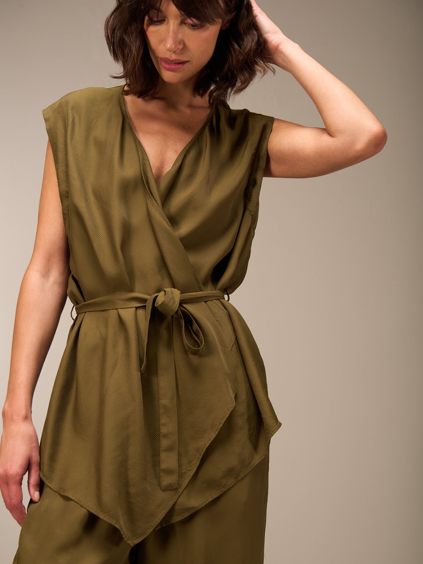 Vest with belt