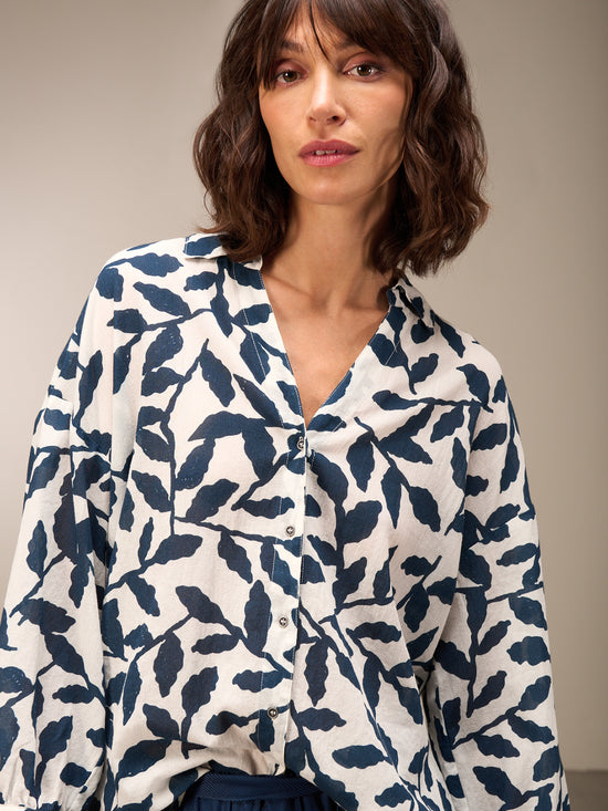Blusa con abbottonatura