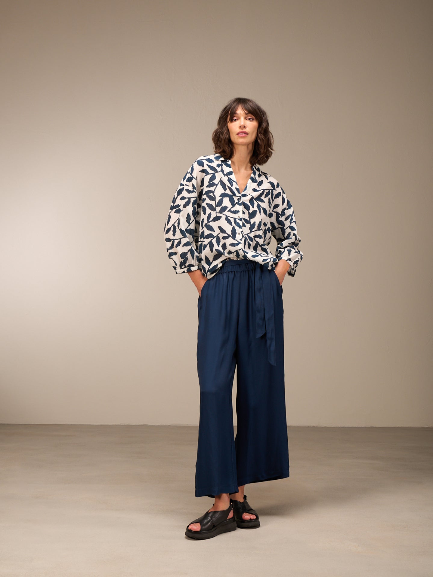 Blusa con abbottonatura
