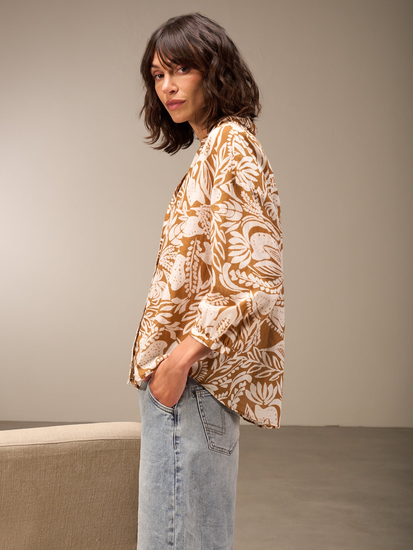 Blusa con abbottonatura