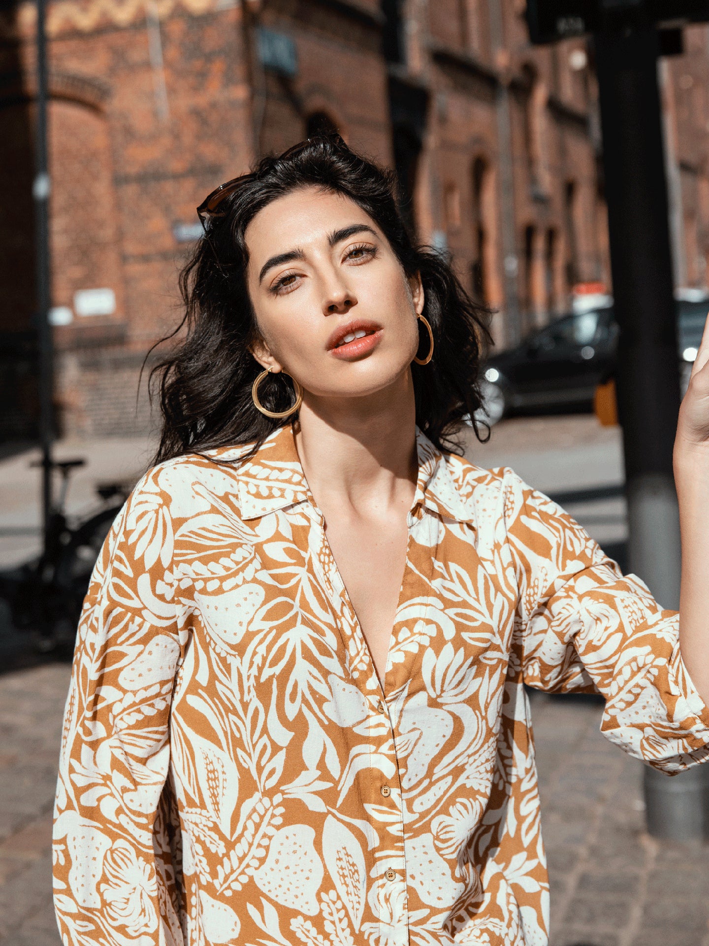 Blusa con abbottonatura