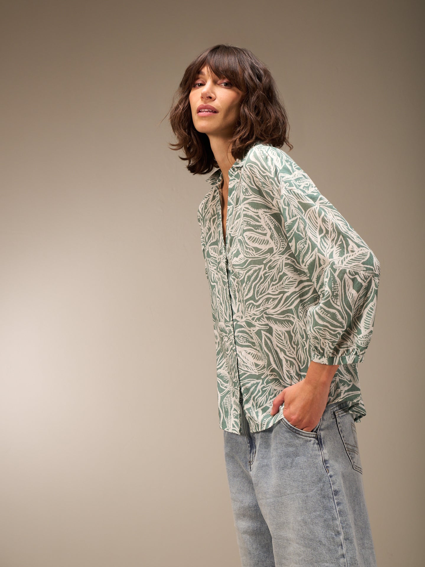 Blusa con abbottonatura