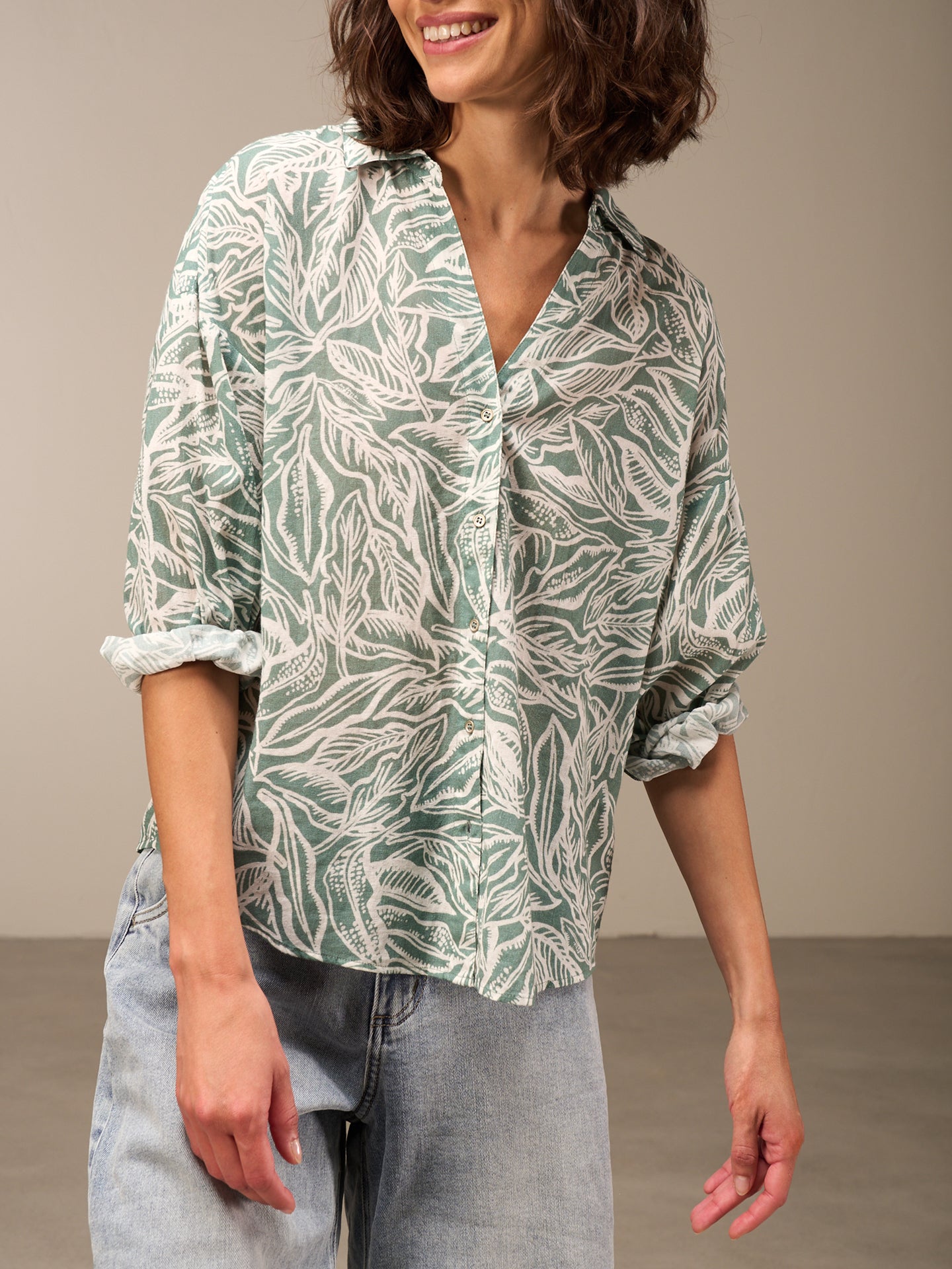 Blusa con abbottonatura