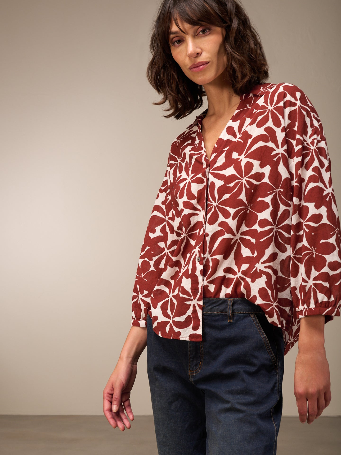 Blusa con abbottonatura
