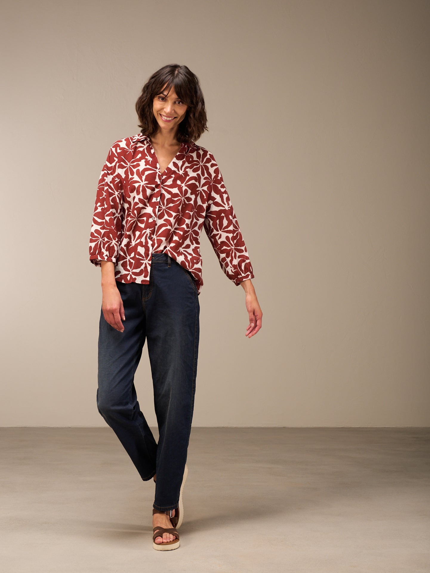 Blusa con abbottonatura
