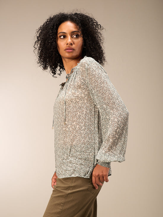 Blusa con dettaglio a balze