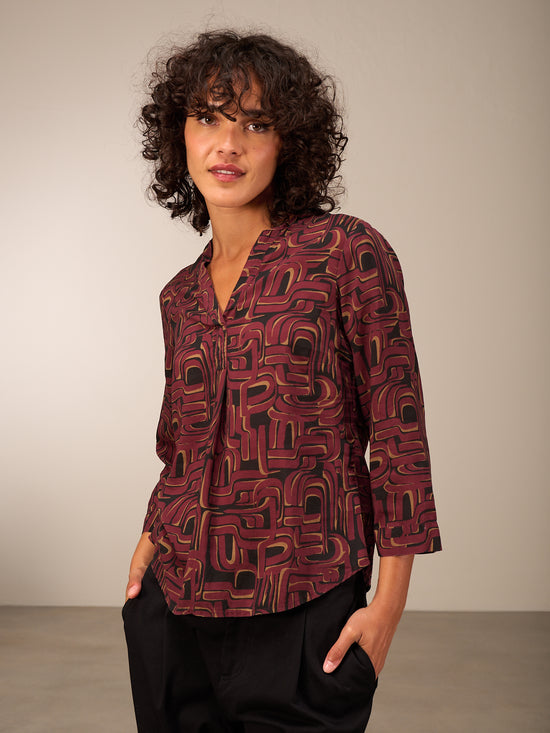 Blouse with stand-up collar