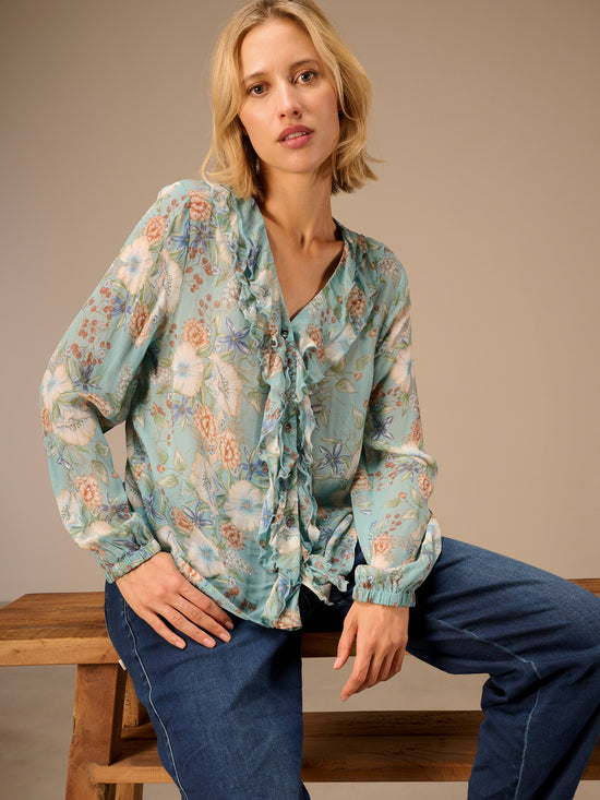 Blusa con dettaglio a balze